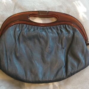 Hand bag clutch